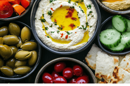 Mediterranean Mezze Platter with Homemade Dips, Veggies, and Flatbreads